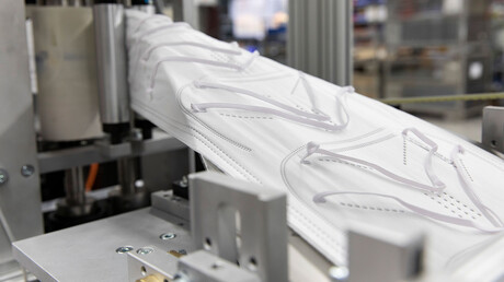 FFP-2-åndedrætsværn i produktionen hos Unimatic.