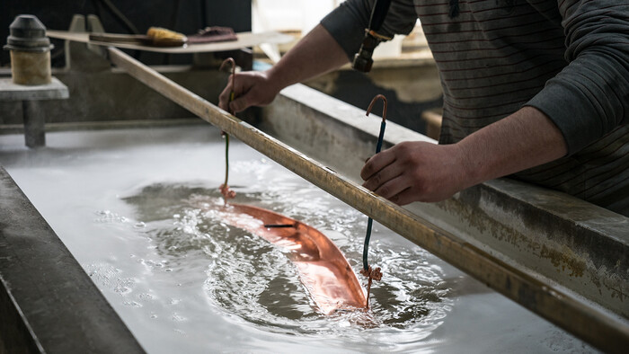 Galvanisering med varmt vand, som er blevet opvarmet af en trykluftkompressor.